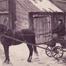 A horse-drawn open carriage